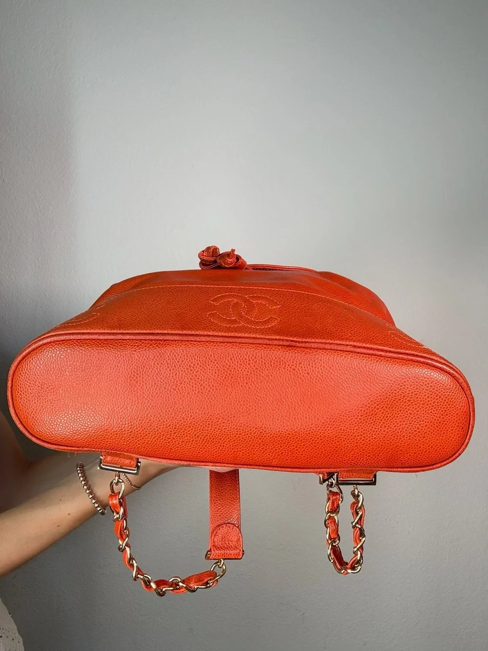 CHANEL Orange Caviar Leather Backpack with CC Trim and Gold Hardware
